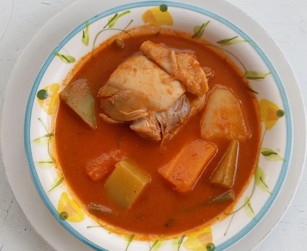 Pepian de pollo (pierna o cuádril)